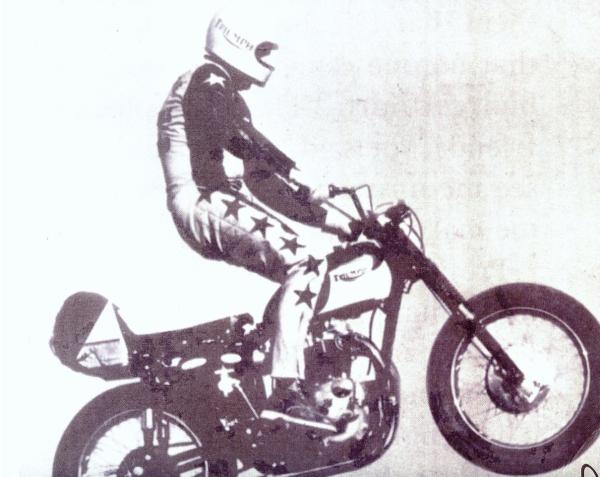 Evel Knievel performing a stunt 