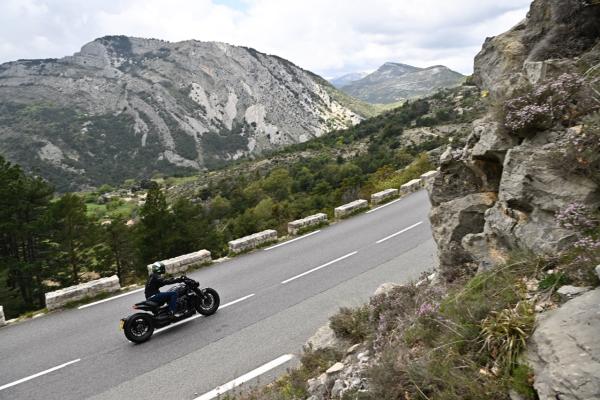 a motorcycle being ridden along a road