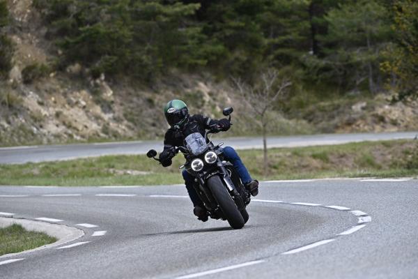 a motorcycle being ridden along a road