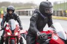 Two riders in the pit lane at Mallory Park