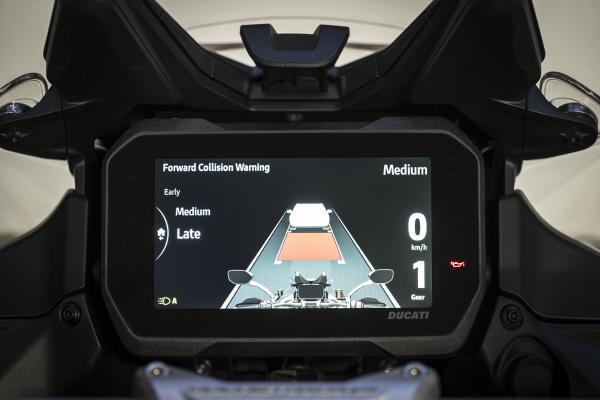 The TFT showing the radar assisted cruise control menu