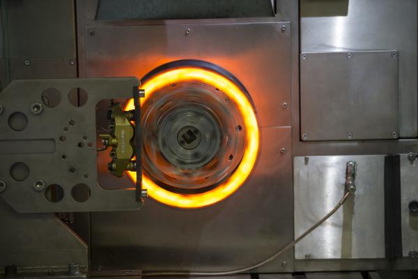 glowing brake discs being tested in the factory