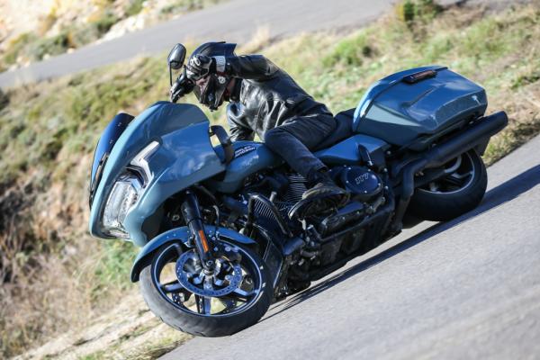 A Harley-Davidson riding along a road