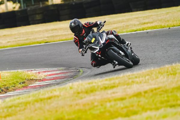 the Tuono 660 Factory going through a corner on track